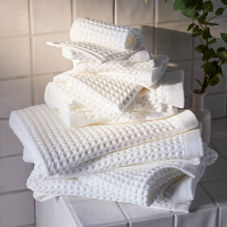 **Brooklinen Waffle Towels** take our top spot for 2025 thanks to their perfect balance of style, absorbency, and lightweight comfort. Made from 100% long-staple Turkish cotton with a 240 GSM, these towels feature a unique waffle weave that enhances drying power while feeling incredibly soft against the skin. Our testers loved how quickly they dried—both on the body and when hung up—making them ideal for humid bathrooms. Available in a range of modern colors, they also add a touch of spa-like elegance. **Pros**: Exceptional absorbency, fast drying, and durable after 20+ washes. **Cons**: Slightly pricier than competitors, though worth the investment. If you’re looking for the **best bath towels** for everyday luxury, Brooklinen