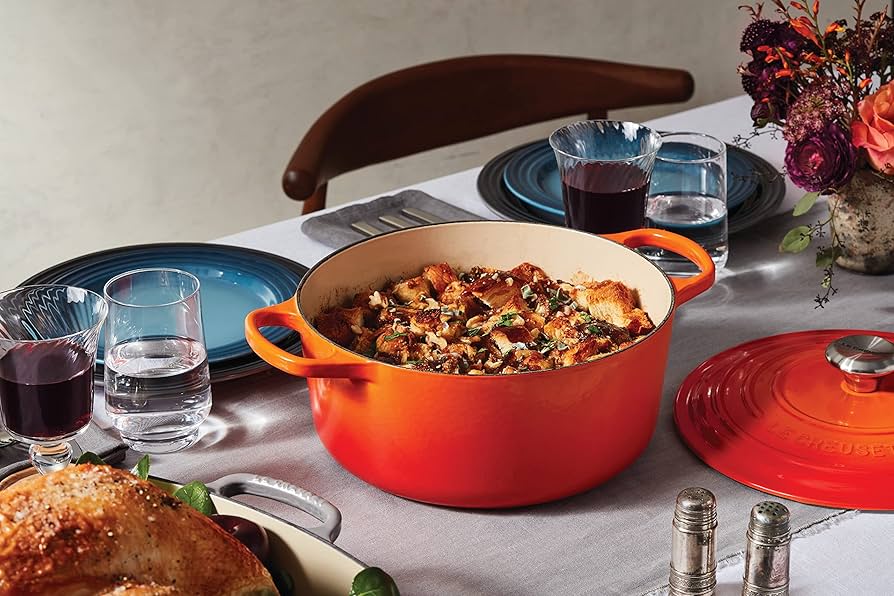**Le Creuset Signature Enameled Cast Iron Dutch Oven** reigns supreme as our top pick for 2025 due to its unmatched versatility and durability. Perfect for slow-cooking stews, baking bread, or braising meats, this iconic piece