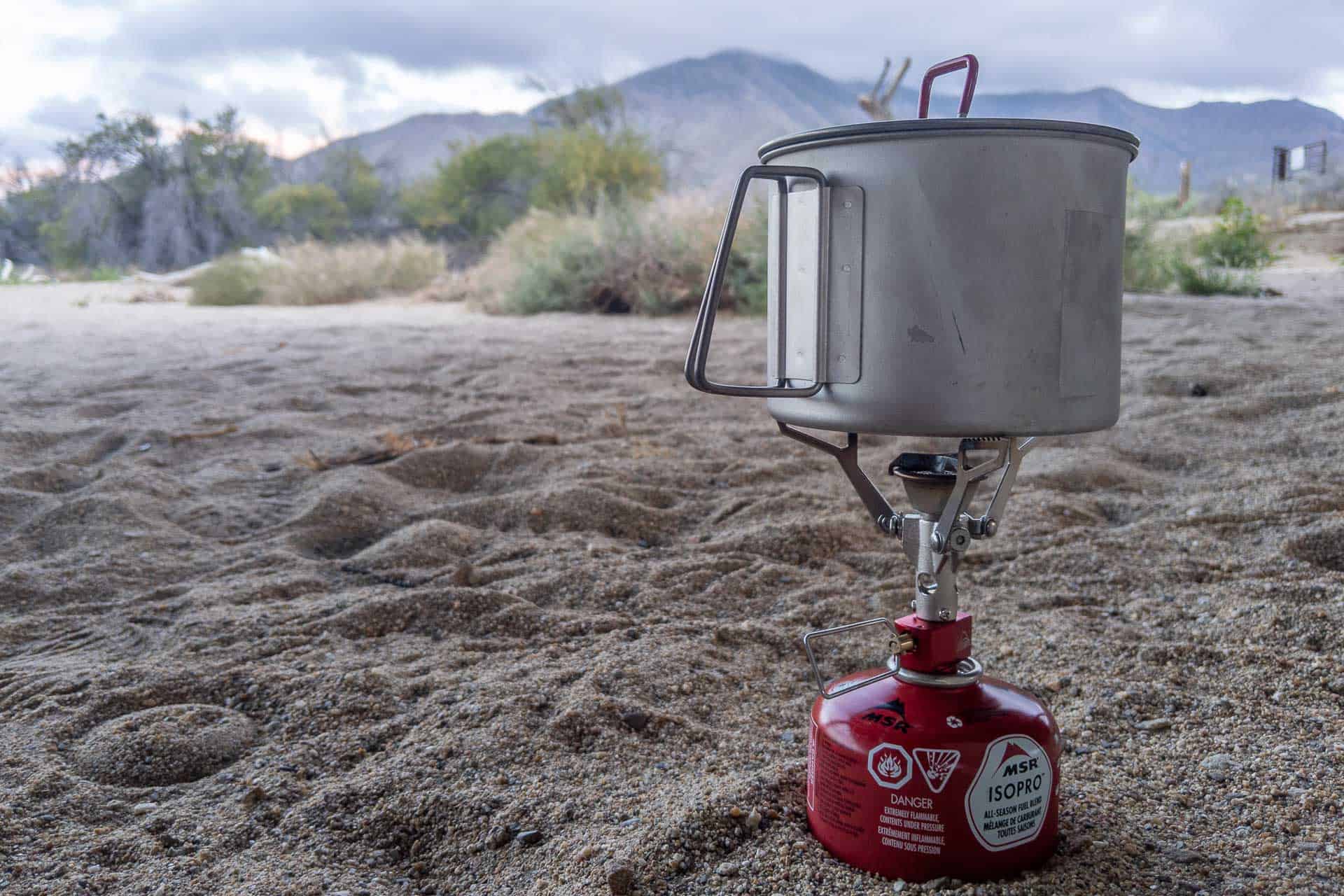 **MSR PocketRocket 2** reigns supreme as our top pick for the best camping stove of 2025. This ultralight backpacking stove weighs just 2.6 ounces, making it a favorite for solo adventurers who prioritize portability without sacrificing performance. It boils a liter of water in under 3.5 minutes, thanks to its efficient burner design, and works flawlessly with canister fuel. We love its adjustable flame control for simmering, a rarity in ultralight stoves. During our tests in windy alpine conditions, it held up impressively with a built-in wind clip. **Pros**: Featherlight, fast boil time, compact. **Cons**: Small burner head struggles with larger pots. Ideal for backpackers seeking reliability and speed, the PocketRocket 2